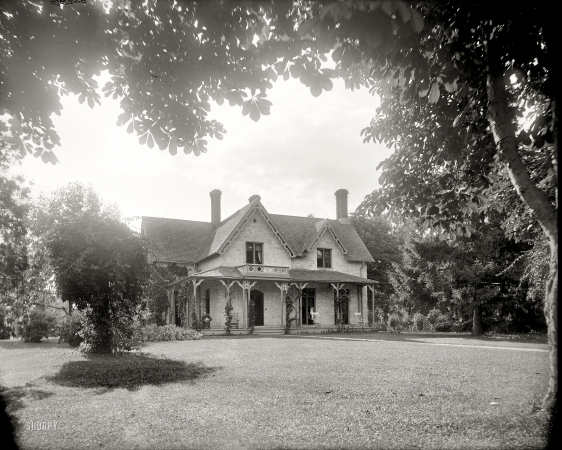 Photo showing: Rio Vista: 1900 -- Wayne County, Michigan. Rio Vista, Grosse Ile. Summer home of William Livingstone, seen on the porch.