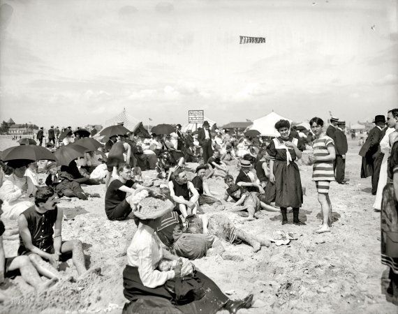 Photo showing: Sand, Sea and More Sand -- Coney Island, New York, circa 1904. Getting their picture took.