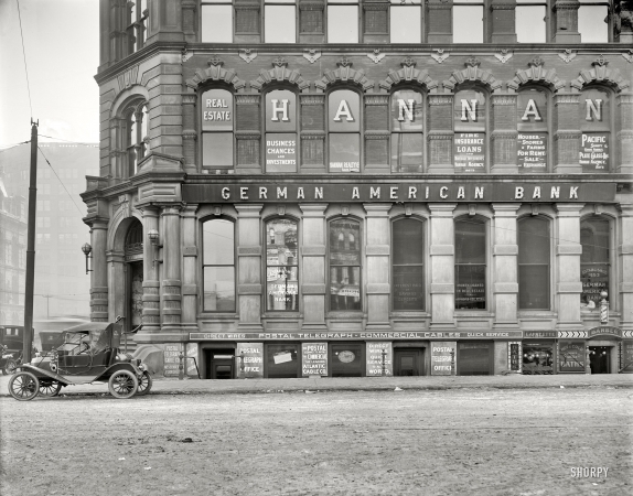 Photo showing: German American Bank -- Postal Telegraph Cable office below German American Bank. Possibly Detroit, Michigan, circa 1911.