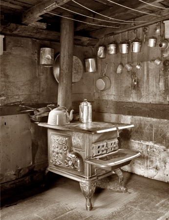 Photo showing: The Old Stove -- September 1935. Garrett County, Maryland. Interior of a house.