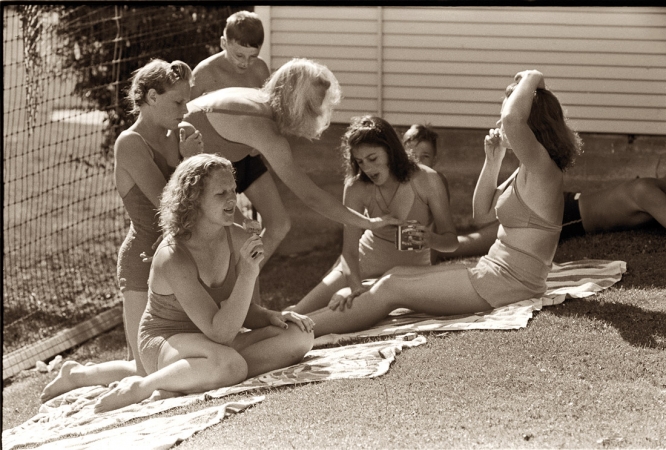 Photo showing: Tomato Salad -- Caldwell, Idaho. July 1941. Sunbathers at city park swimming pool.
