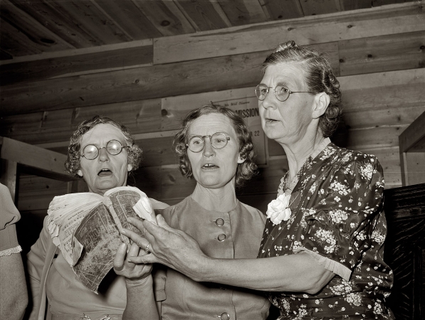 Photo showing: Pie Town Singers -- June 1940. Three members of the ladies' quintet at a community sing in Pie Town, New Mexico.