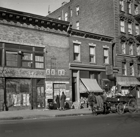 Photo showing: Sal the Grocer -- Bronx, New York, December 1936. Tenement district from which many of the New Jersey homesteaders have come.