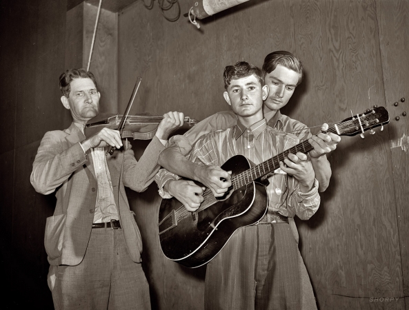 Photo showing: The Drake Family -- Feb. 1942. Weslaco, Texas. Fiddler Nathan Drake, Jasper Sleepy Drake and big brother Weldon Drake. 