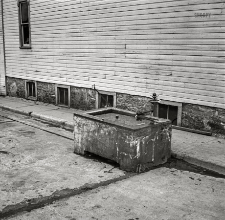 Photo showing: Equine Infrastructure -- July 1937. Horse watering trough. New Glarus, Wisconsin.