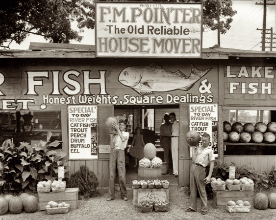 Photo showing: Catfish Mover Watermelon -- Summer 1936. Roadside stand near Birmingham, Alabama.