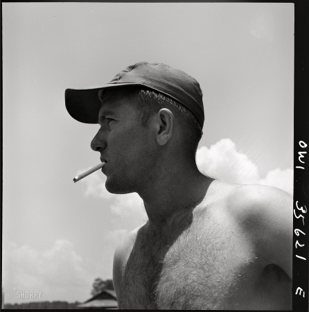 Photo showing: Smoke if You Got Em -- July 1943. Myrtle Beach, S.C. Air Service Command. Mobile chief Technical Sergeant Vasile Choken.