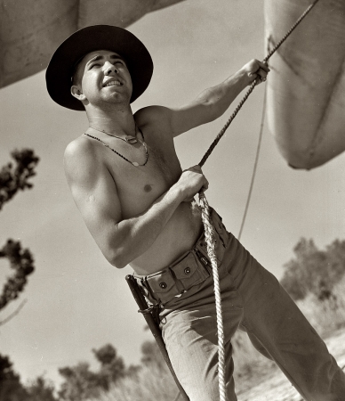 Photo showing: Grunt Work -- May 1942. A member of a Marine barrage balloon unit in training at Parris Island, South Carolina.