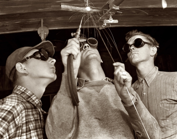 Photo showing: Brave New World -- Daytona Beach, Florida April 1942. Aircraft construction class. Training for overhead welding.