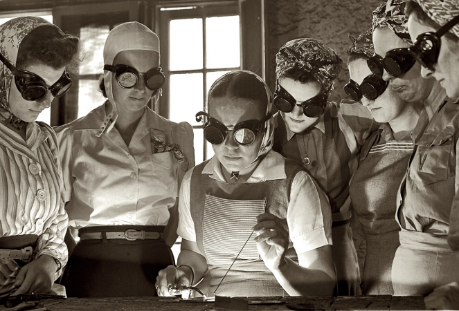 Photo showing: Look into the Light -- April 1942. Secretaries, housewives, waitresses, women from all over Central Florida are learning war work.