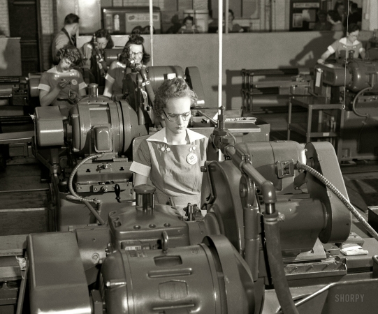 Photo showing: Wartime Grind -- Chicago, August 1942. Women at work for victory, Republic Drill and Tool Company.