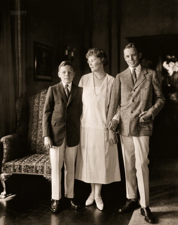 Photo showing: Fancy Pants -- New York, 1922. New and especially posed photo of Mrs. Charles H. Sabin, wife of the president
of the Guaranty Trust Company of New York, and her two sons, P. Morton Smith and James H. Smith.