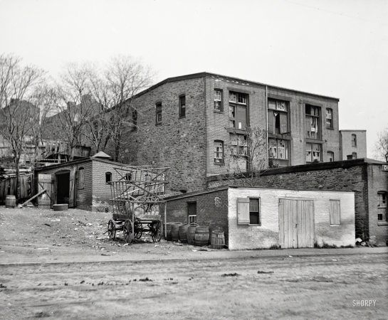 Photo showing: Ramshackle Storage -- Washington, D.C., circa 1900. Old warehouse, Water Street S.W.