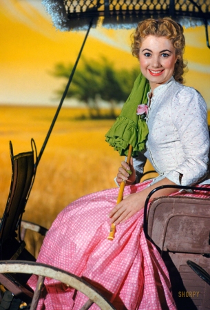 Photo showing: Shirley With the Fringe -- December 1954. Actress Shirley Jones on the set of the film version of the Rodgers and Hammerstein musical Oklahoma!