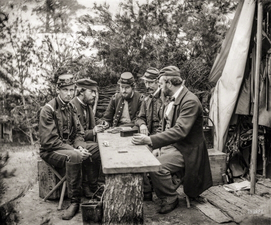 Photo showing: French Freres -- May 1862. Yorktown, Virginia (vicinity). Camp Winfield Scott. Duc de Chartres,
Comte de Paris, Prince de Joinville and friends playing dominoes at mess table.