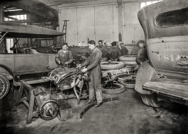 Photo showing: Intensive Car Care -- March 17, 1919. Interior of main garage of American Red Cross, 79 Rue Laugier, Paris, France.