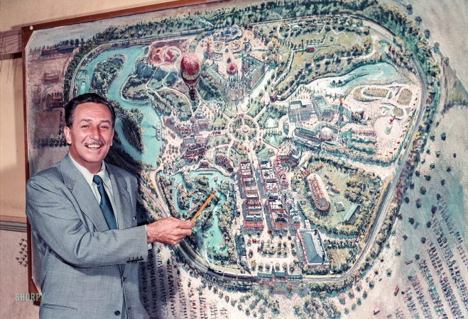 Photo showing: Tomorrowland -- July 1954. Los Angeles. Walt Disney pointing to a plan for Disneyland, under construction in Anaheim.
