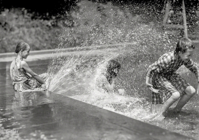 Photo showing: Sprayed Sprites -- Summer 1912. District of Columbia parks. Children at fountains and pools.