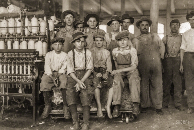Photo showing: Brazos Mill Boys -- November 1913. West, Texas. Some of the younger boys working in Brazos Valley Cotton Mills.