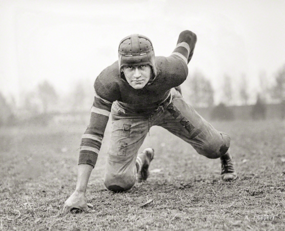 Photo showing: On the Line -- 1920. John Loehler, formerly of Tech High, now a Hatchetites gridiron star.