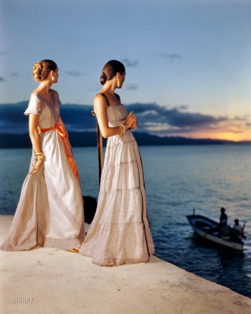 Photo showing: Yanny and Laurel -- November 1946. Women in evening gowns on waterfront. San Juan, Puerto Rico.