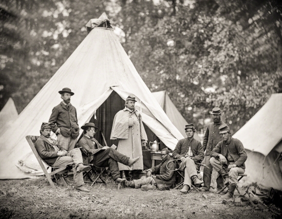 Photo showing: At Ease -- June 1863 Gettysburg Campaign. Fairfax Court House, Virginia. Capt. J.B. Howard,
Office of Assistant Quartermaster, and group at headquarters, Army of the Potomac. 