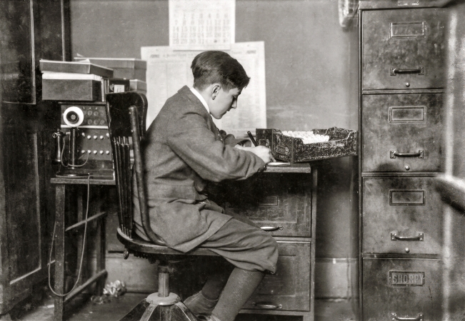 Photo showing: Office Boy -- January 1917. Young office boy, working for J.J. O'Brien and Sons on East 23 Street.