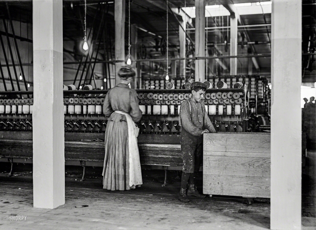 Photo showing: Doffer and Spooler -- December 1908. Newton, North Carolina. Catawba Cotton Mill doffer and spooler.