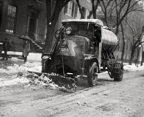 Photo showing: Snow to Go -- Washington, D.C., 1922. Tank truck with plow clearing snow.