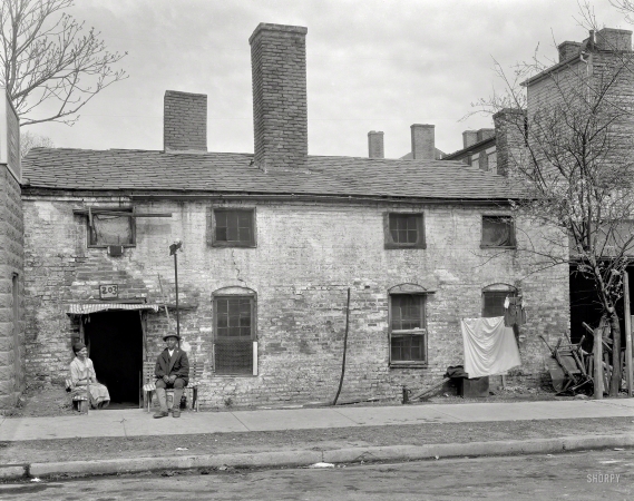 Photo showing: The Signpost Up a Head -- Fredericksburg, Va., circa 1927. Tenement, 203 Charlotte Street, residence of 'Gover­nor Hill.'.