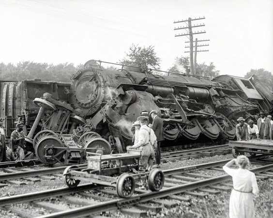 Photo showing: Wheels Up -- July 31, 1922. Laurel, Maryland. Two B&O freights wrecked in head-on crash at Laurel switch.