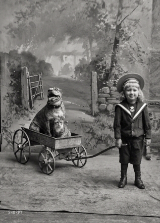 Photo showing: Whos a Good Boy? -- Circa 1894. The son (and dog and cat) of Washington, D.C., hotelier Fritz Reuter.