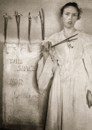 Photo showing: Your Message Here -- Circa 1900. Elizabeth Felix with paperwhites (Clarence White's sister-in-law holding daffodils).