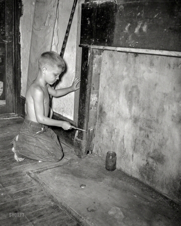 Photo showing: Fireside Lad -- Columbus, Georgia, circa 1950. Housing.