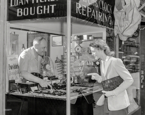 Photo showing: Fates Fickle Finger -- New York, 1944. Pawnbroker and prospective customer.