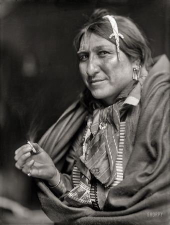 Photo showing: Smoke Signal. -- Circa 1900. Joe Black Fox, a Sioux Indian from Buffalo Bill's Wild West Show.