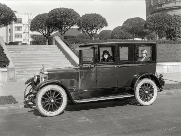 Photo showing: It Is Ridden -- San Francisco circa 1923. Barley sedan on California Street at Huntington Park.