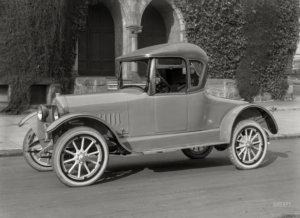 Photo showing: Two for the Road -- San Francisco circa 1919. Velie two-passenger roadster at First Unitarian Church.