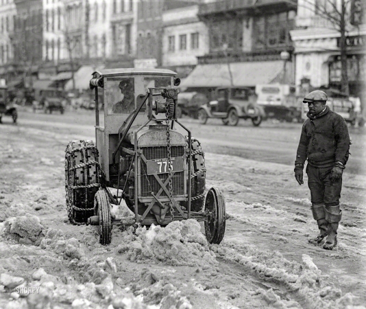 Photo showing: Snow Going -- Washington, D.C., 1925. Snow removal -- Ford tractor.