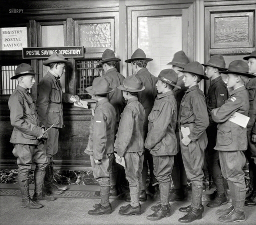 Photo showing: Thrifty Scouts -- Washington, D.C., circa 1913. Boy Scouts -- Postal Savings. Scouts depositing.