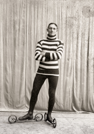 Photo showing: Roll Model -- Circa 1905. Roller skating -- young man on bicycle skates.