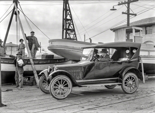 Photo showing: Angler-Saxon -- San Francisco, 1921. Saxon auto on dock with fishing boats.