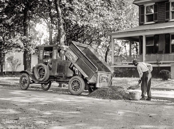 Photo showing: Coal to the Curb -- Washington, D.C., 1925. Ford Motor Co. -- A.P. Woodson Co. coal truck.