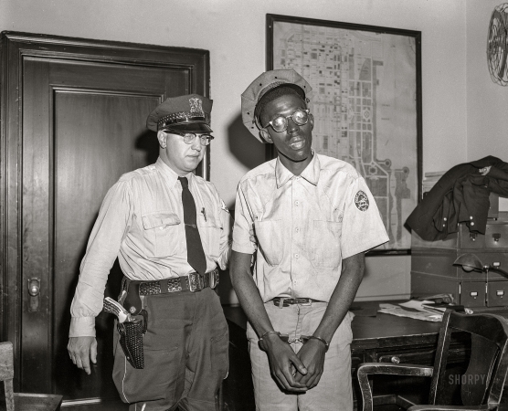 Photo showing: Canceled! -- Chicago circa 1953. Post Office employee under arrest.