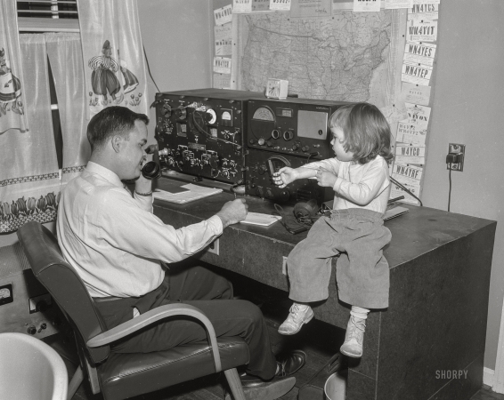 Photo showing: Ham Dad -- An amateur radio operator and his assistant circa 1960.