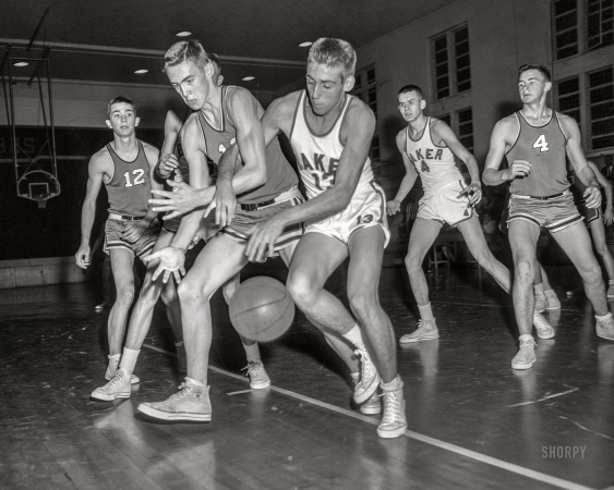 Photo showing: I Wuz Robbed! -- From around 1960 in Columbus, Georgia, comes this
News Archive snap of a Baker Lion liberating the basketball.