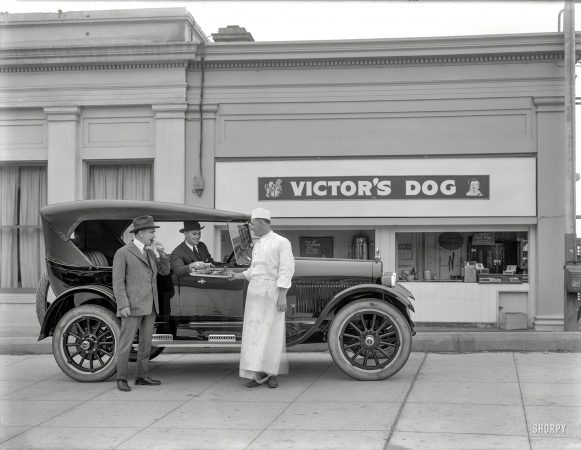 Photo showing: Dogs to Go -- San Francisco circa 1923. Buick touring car at Victor's Dog.
