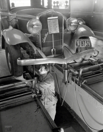 Photo showing: Doctor of Tires -- San Francisco, 1934. Fisk Service garage.
