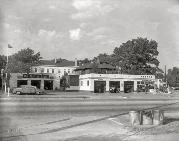 Photo showing: The Muffler Shop -- Columbus, Georgia, circa 1960. Midas Muffler Shop and Texaco service station.