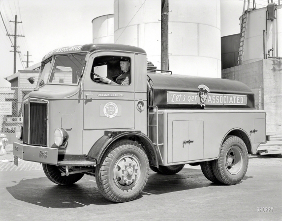 Photo showing: Canned Heat -- August 9, 1935. San Francisco. GMC truck -- Associated Oil fuel tanker.